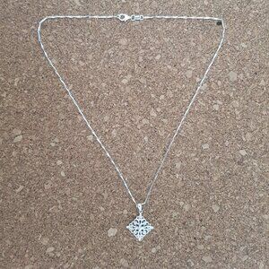 Sterling silver necklace with filigree pendant